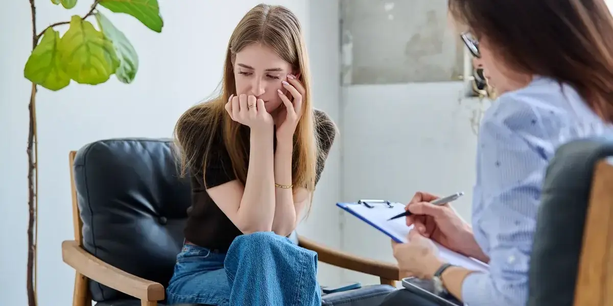 Patient receiving guidance about EXOMIND Therapy for cognitive wellness
